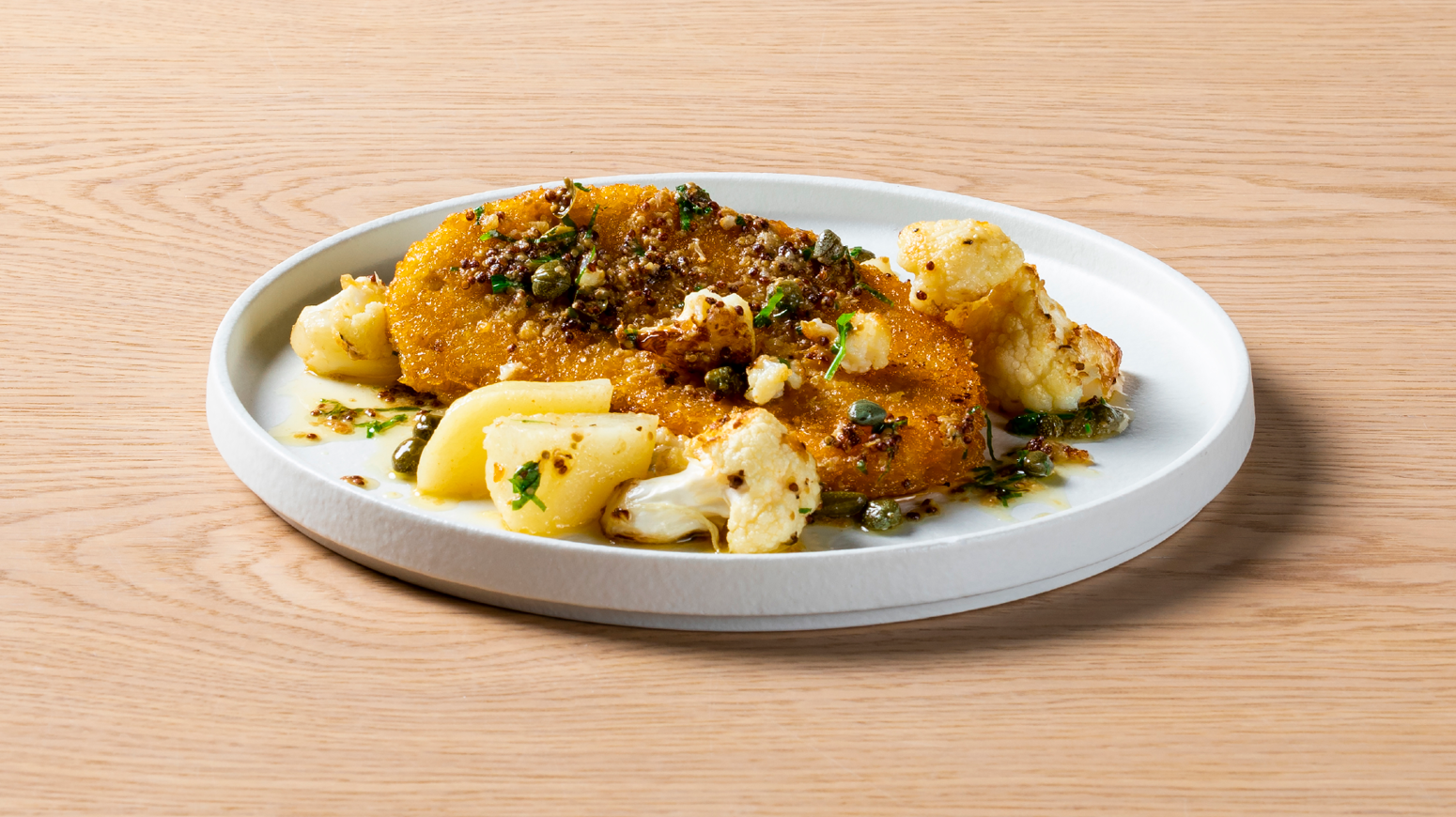 SPRØ VEGETARSNITZEL MED GRØNNSAKER OG SITRONSMØR