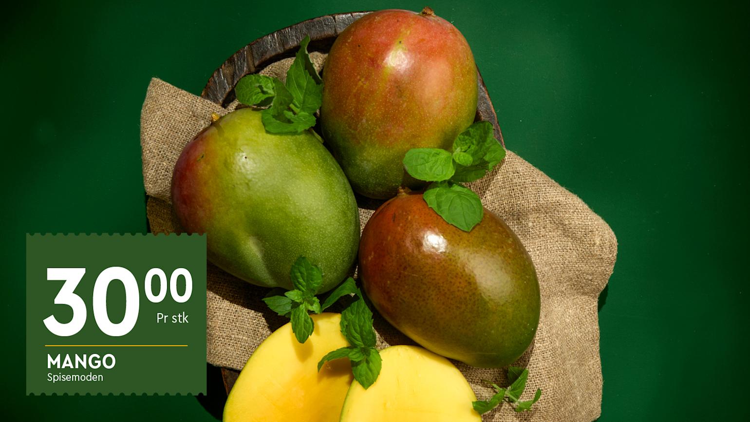 Del av fruktsjefens favoritter. Mango ligger i en treskål.