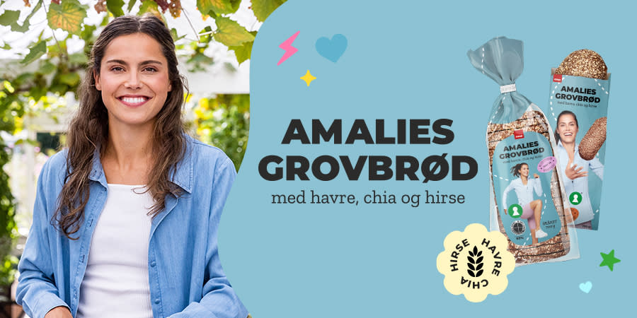 Amalie Luel smiler og ved siden av ser vi brød fra hennes grovbrødserie