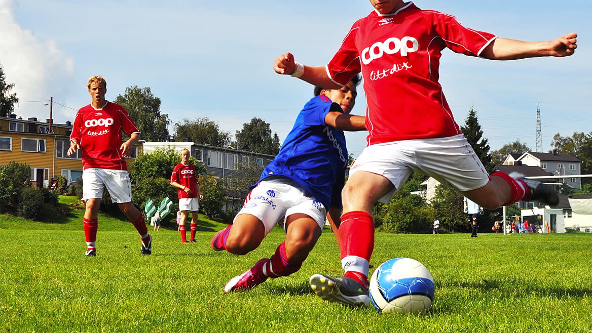 Fotball spillere på fotball banen